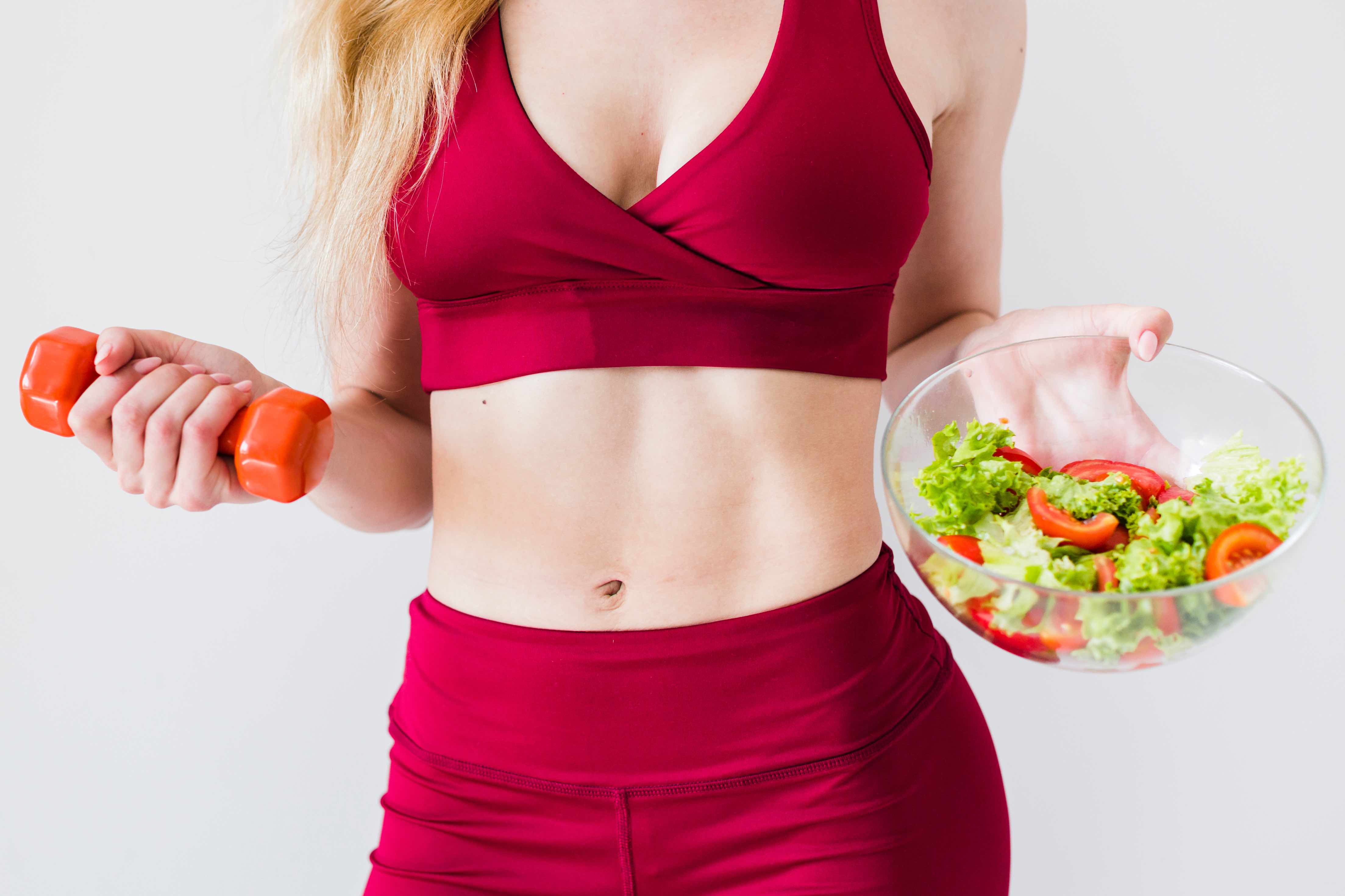diet-concept-with-sport-woman-healthy-food.png