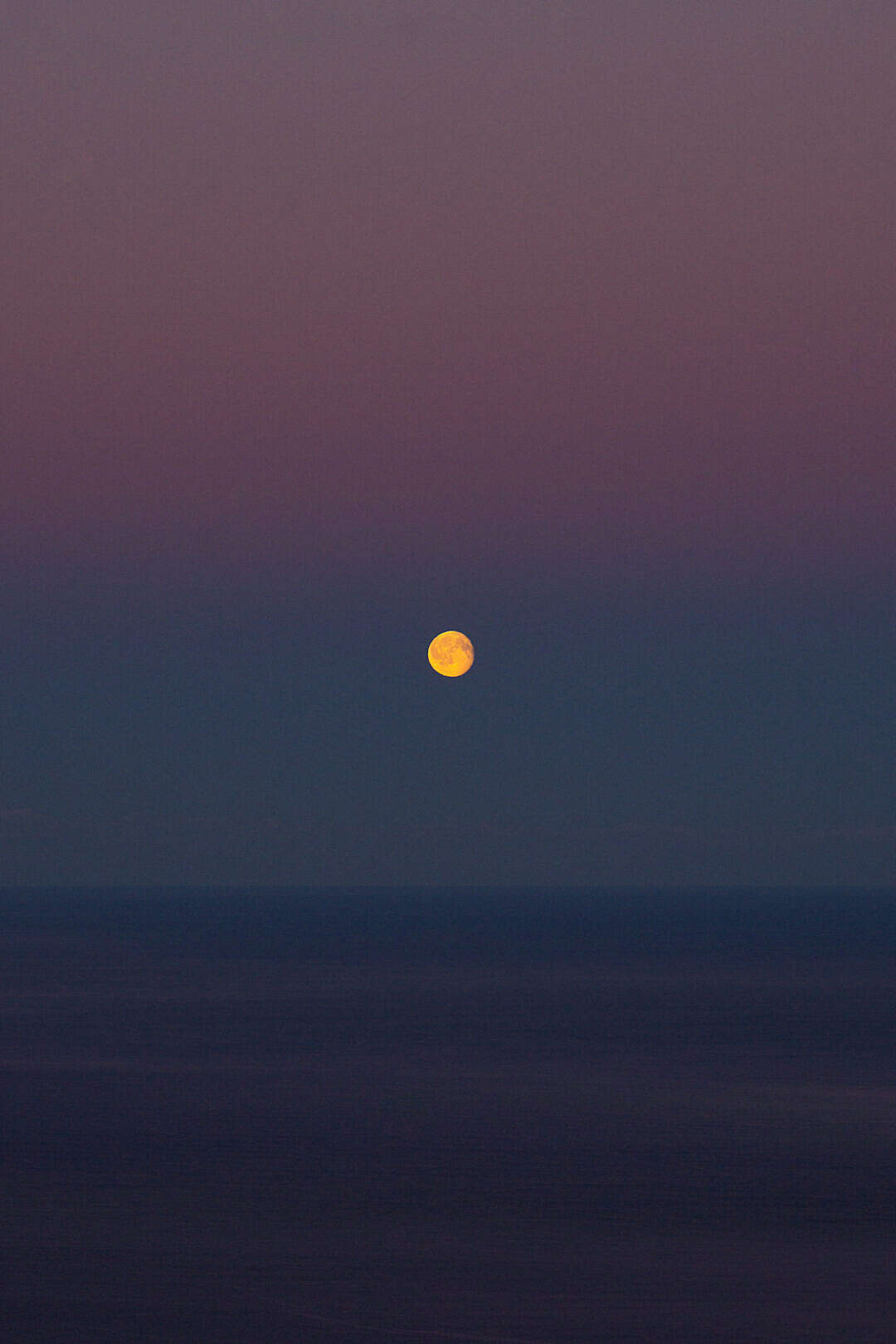 moon-over-the-sea-on-a-colorful-dawn-sky-free-photo-1080x1620.jpg