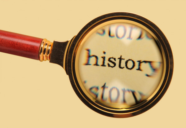 depositphotos_2478371-stock-photo-old-magnifying-glass-on-word.jpg