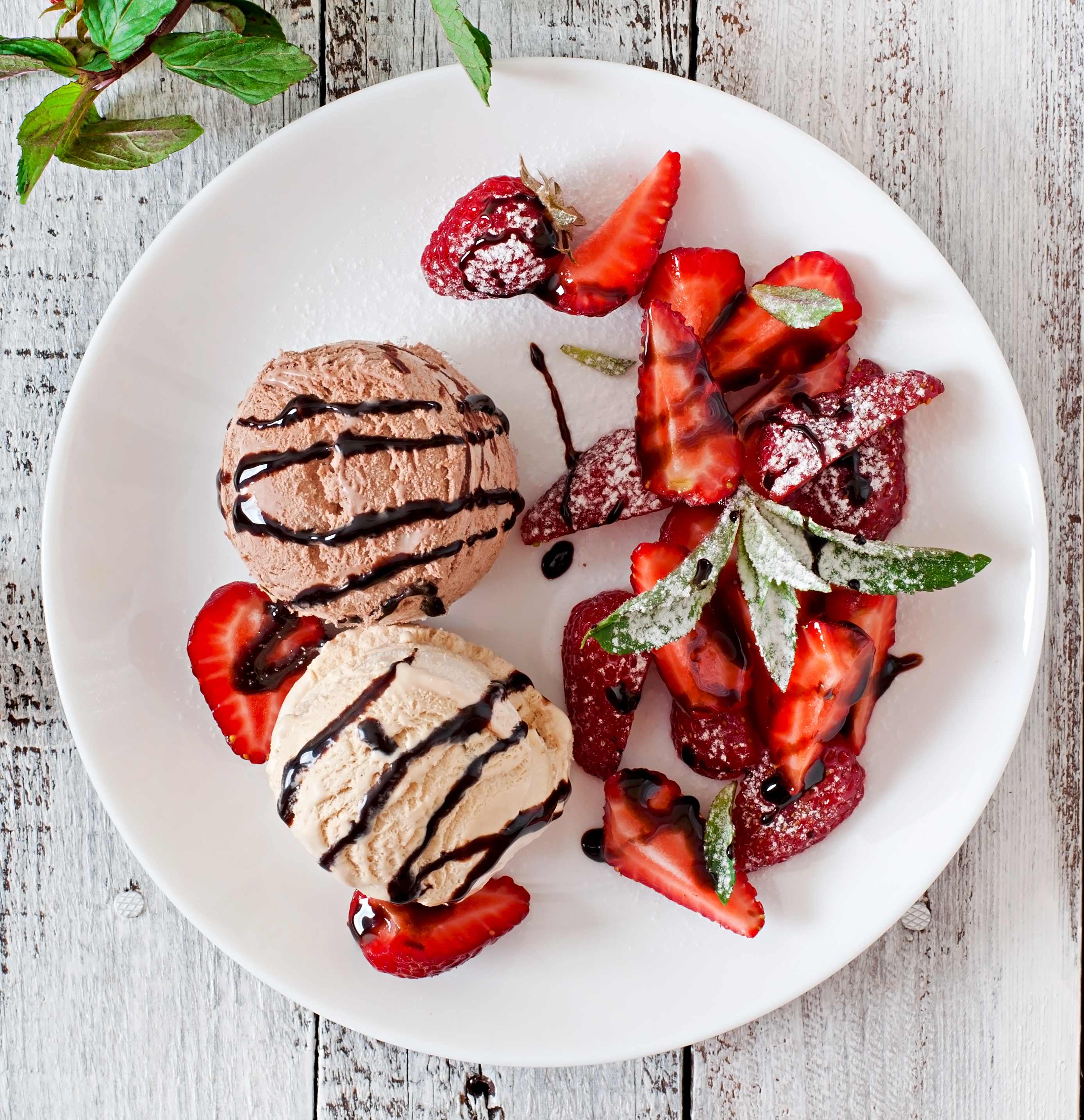 ice-cream-with-strawberries-chocolate-white-plate.jpg