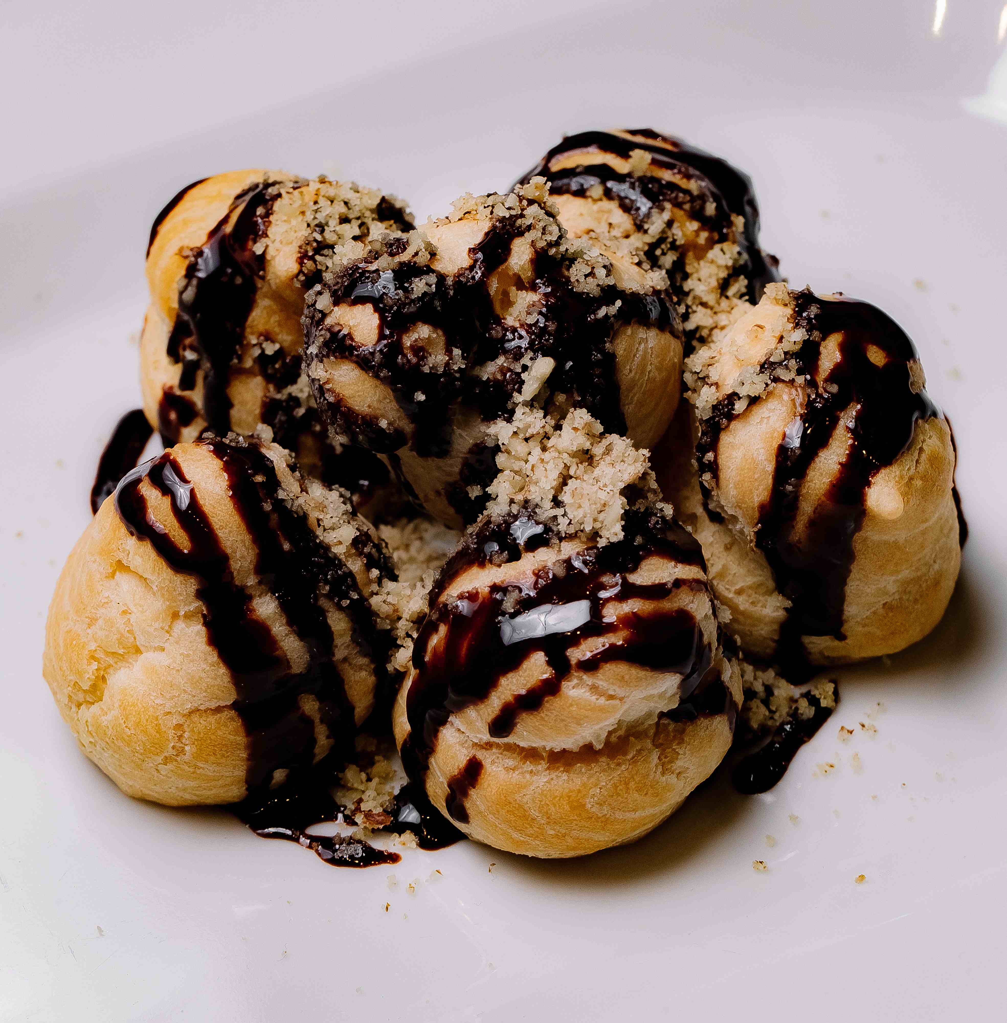 front-view-profiteroles-with-chocolate-icing.jpg