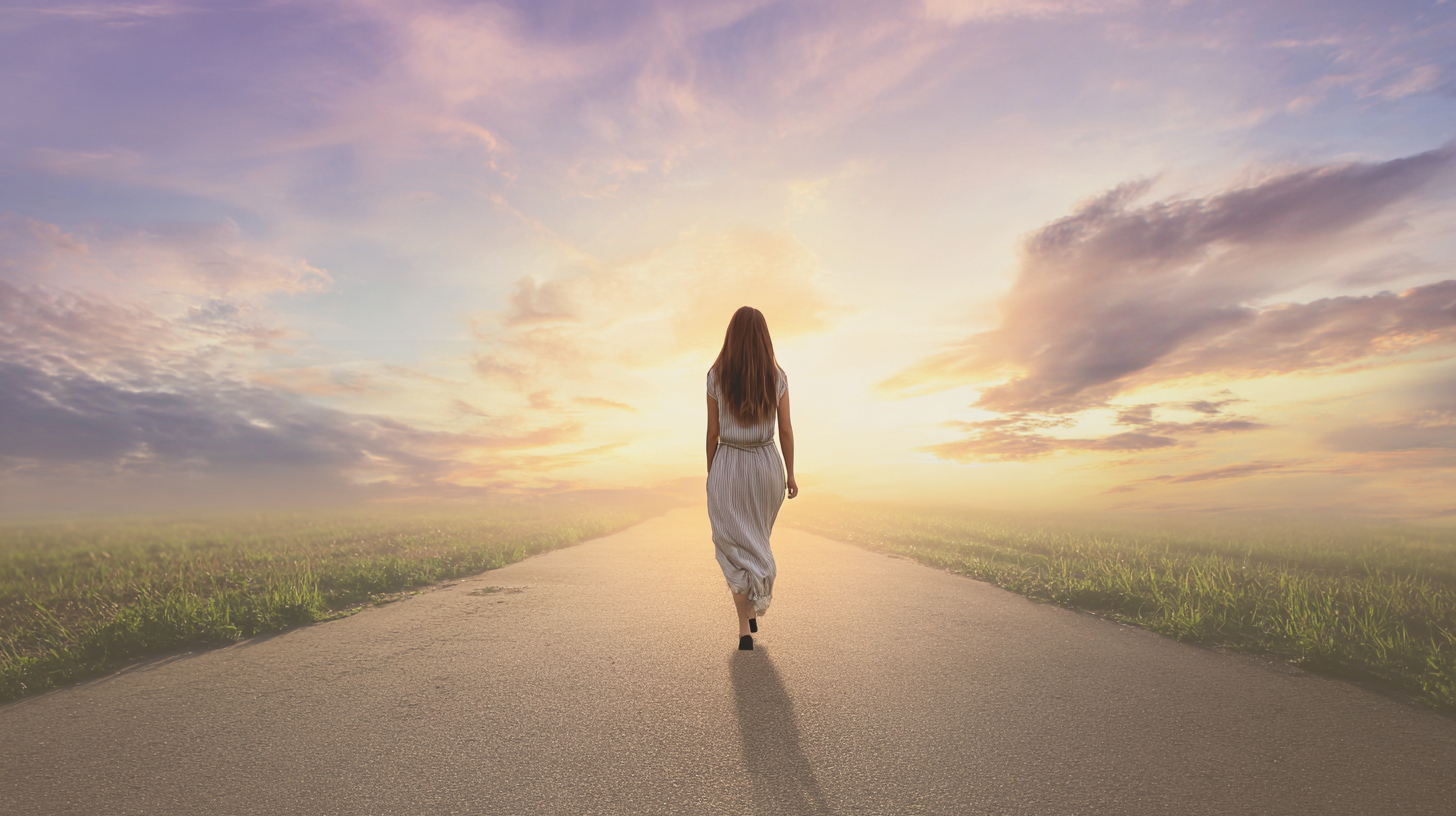 u2198524582_a_woman_walking_toward_a_beautiful_dawn_sky_warm__18844114-ab86-4797-9b19-b57bf856cf07_3.png