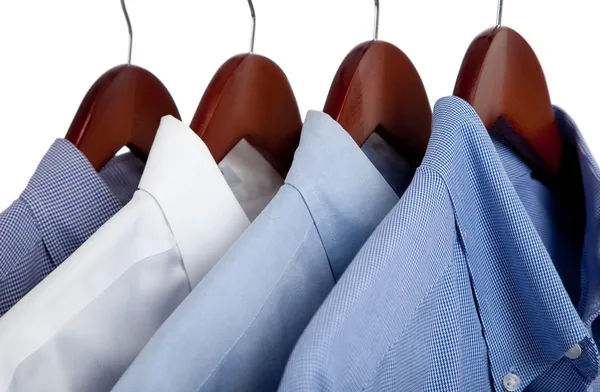 depositphotos_13441061-stock-photo-blue-dress-shirts-on-wooden.jpg