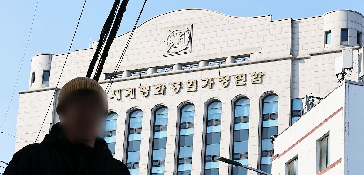 104,12月15日，在首尔龙山区，警方对统一教首尔总部办公楼进行搜查取证。图为统一教首尔总部办公楼。 韩联社~コピー.jpg