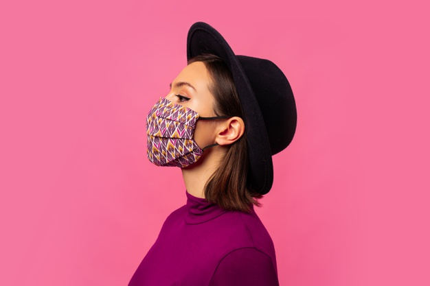 young-brunette-girl-wearing-respiratory-face-mask-against-coronavirus_273443-3987.jpg