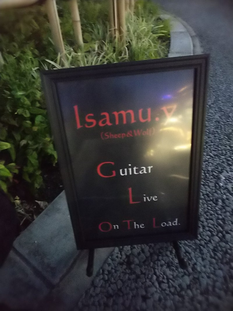 路上ライブの看板.jpg