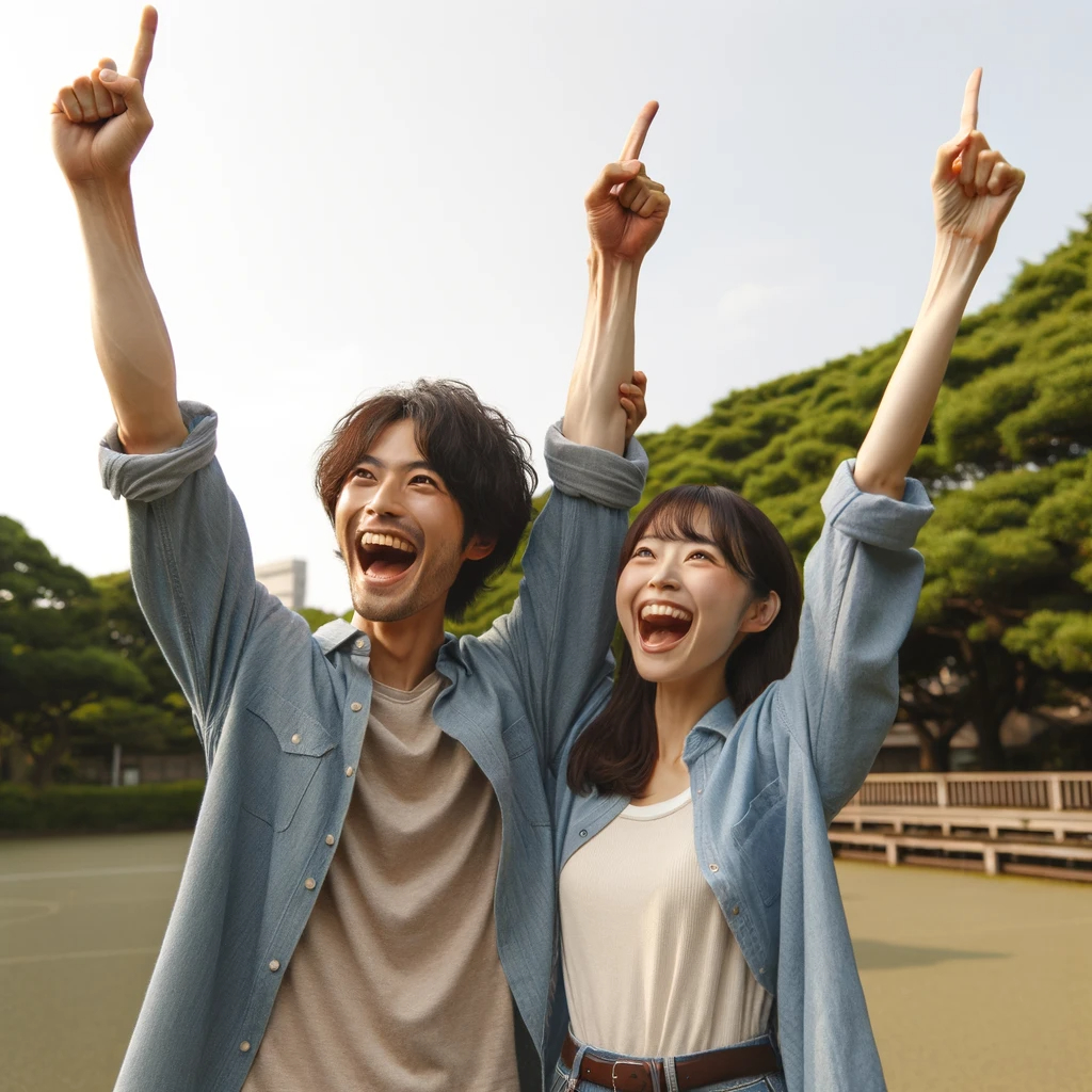 DALL·E 2024-02-09 12.30.50 - A Japanese man and woman raising their hands in the air with joy and excitement, celebrating together outdoors. They are in a park or a similar natura.png